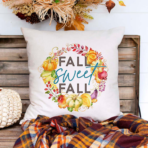 Fall linen pillow cover with text that says fall sweet fall inside of a pumpkin and gourd wreath.  Modern farmhouse style pillow cover home decor.