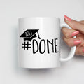 Graduation ceramic mug with #done and a graduation cap with the graduation year