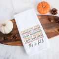 A fall tea towel printed with a list of fall favorites: crackling fires, crunchy leaves, hot coffee, crisp mornings, chilly nights, football, cozy sweaters, pumpkin everything, this is fall.  This can be used as a hand towel, kitchen towel, decorative towel, bathrooom towel, and more.