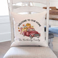 Personalized fall linen pillow cover with text that says welcome to our home and a family name with a fall red truck and pumpkins.  Modern farmhouse style pillow cover home decor.