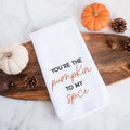 White kitchen tea towel printed with you're the pumpkin to my spice.  Decorative Towel printed with the text you're the pumpkin to my spice.